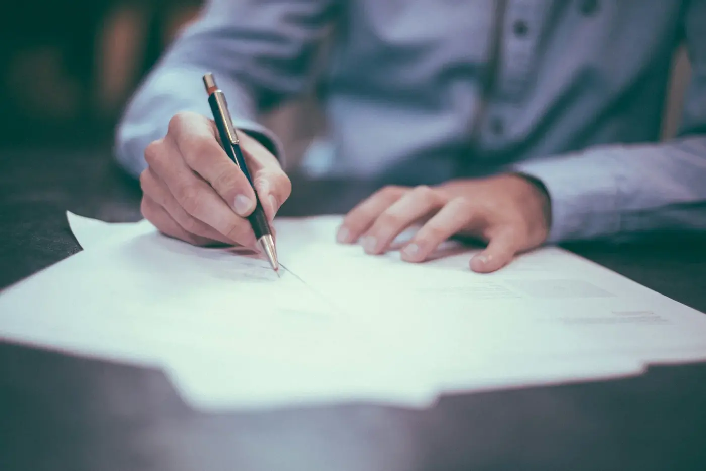 Professional reviewing real estate tax documents